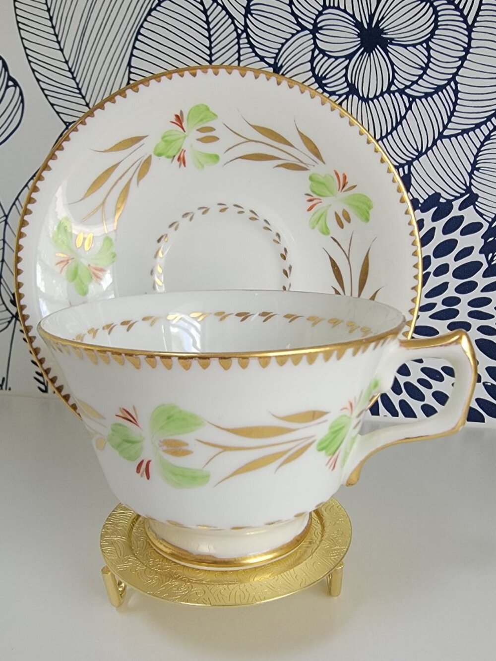 H M Sutherland teacup & saucer set, soft green flower with gold leaves gold trim